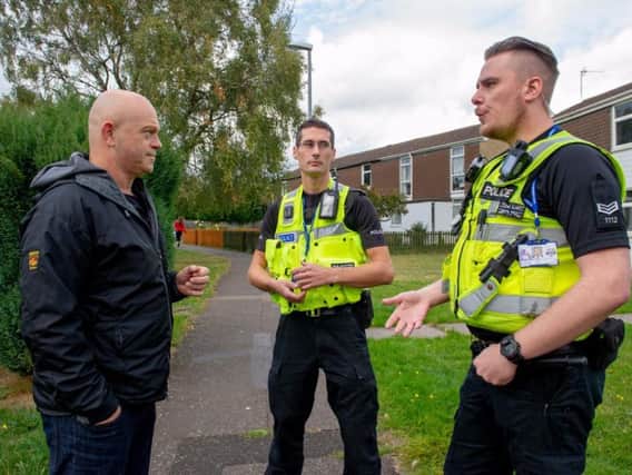 Ross Kemp came to town yesterday to revisit the site where one police officer was stabbed four years ago. Kemp  (on the left) is pictured with PC Monk and PC Liddle.