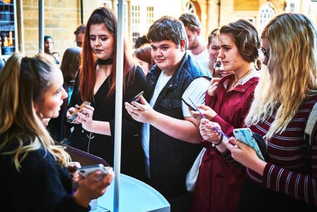 The town's shopping centre was bustling on Monday night as big name brands discounted their wares for students.