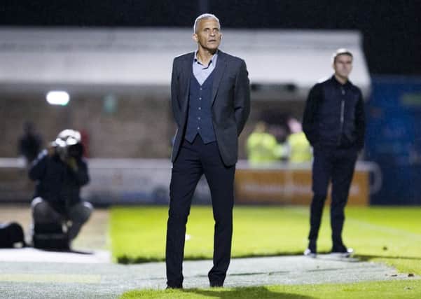 Cobblers boss Keith Curle watches his new team in their 0-0 draw with Bury on Tuesday