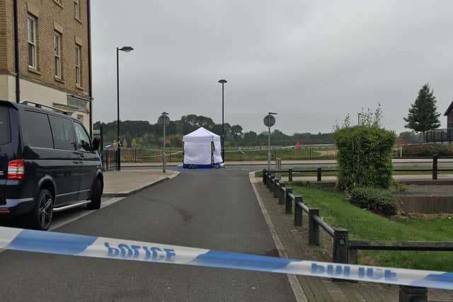 The forensic tent remained in place at the scene this morning