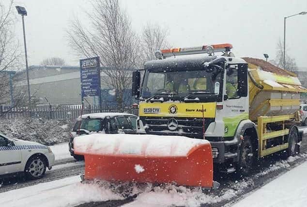 Snowplough clearing the county roads during bad weather.