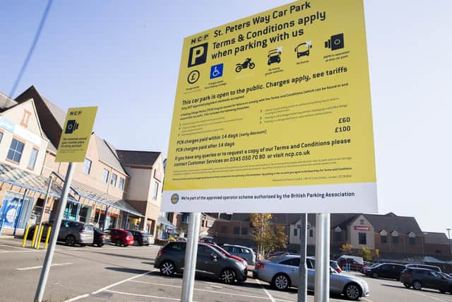 Details of the charges for blue badge holders are displayed on a large sign at the front of the car park... but in small writing.