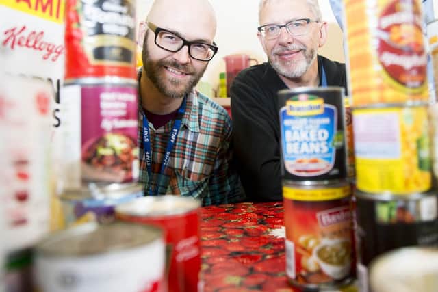 Picture l-r: James Sheppard helps to run the social supermarket with chief executive of the Hope Centre Robin Burgess.