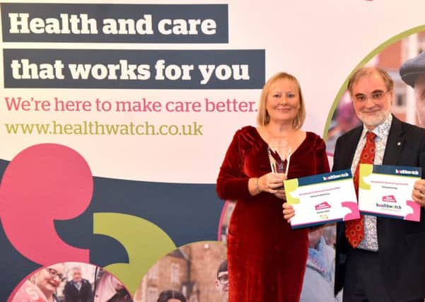 Kate and David with the Healthwatch award and commendations