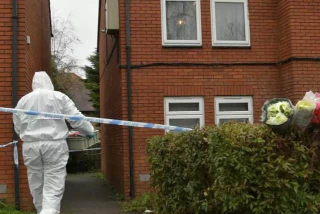 Forensic teams at the flat in Arthur Street.