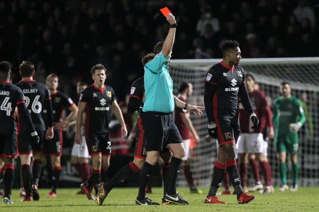 FRAYED TEMPERS: Chuks Aneke was sent off in stoppage-time of last season's meeting at Sixfields after an incident involving John-Joe O'Toole