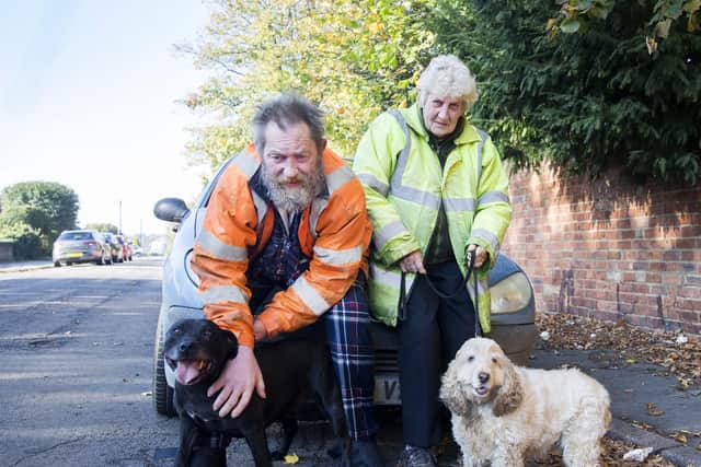 Pictured l-r: Nigel Tysoe pictured with staffie Titan, wife Jennifer, and cocker spaniel Becky. Pictures: Kirsty Edmonds.
