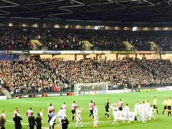 Some o f the 7,000 Cobblers fans who travelled to Milton Keynes for an FA Cup clash in 2016