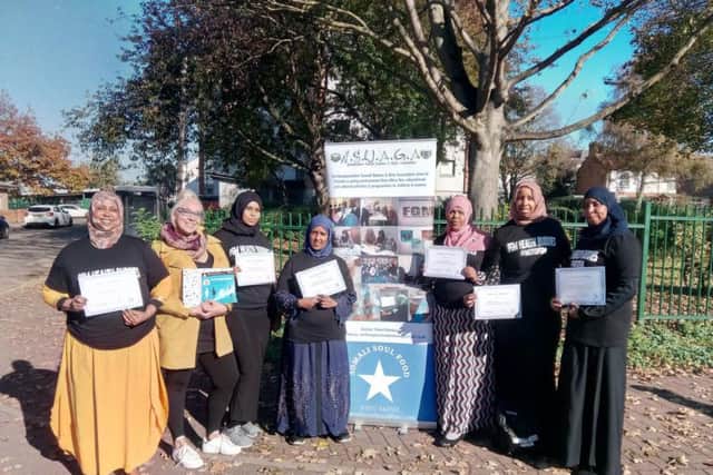 Members of Somali Women and Girls with (second left) Laney Holland, pictured in Spring Boroughs