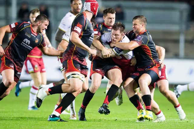 Teimana Harrison was typically tenacious as he carried the fight to the Dragons