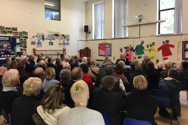 Andrea Leadsom addresses her constituents at a public hearing on Saturday