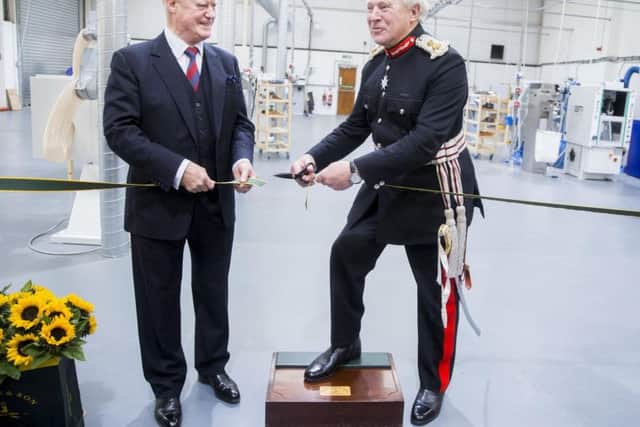 Foster & Son chairman Richard Edgecliffe-Johnson and Lord Lieutenant David Liang cut the ribbon.
