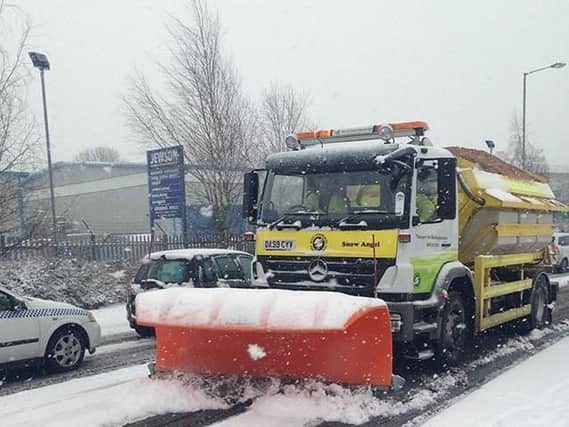 A snow plough clearing the county's roads.