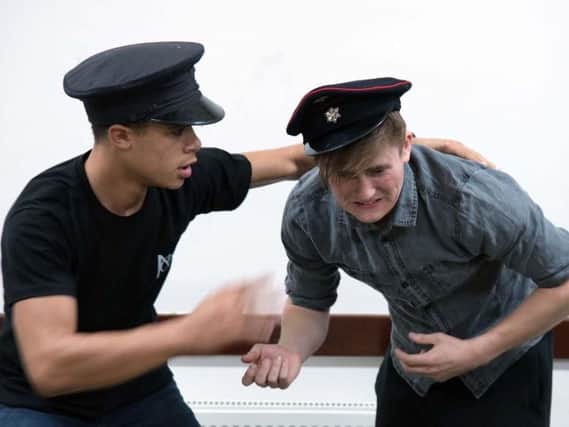 The actors in rehearsals