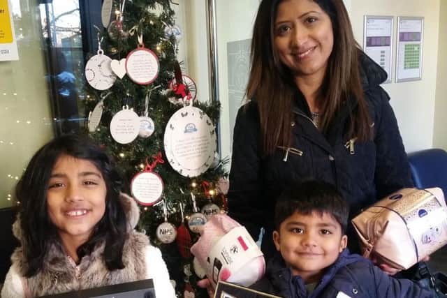Sonul Bhundia and her children Elina and Krishan donated a car boot full of gifts for last years appeal.