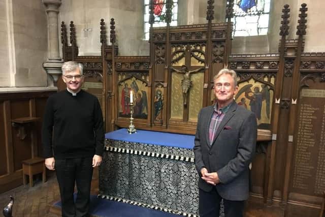 Vicar Reverend Canon Nicholas Setterfield with researcher Martin Stone at St Matthew's Memorial Chapel