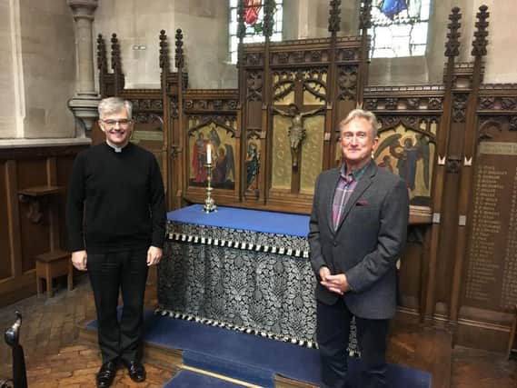 Vicar Reverend Canon Nicholas Setterfield with researcher Martin Stone at St Matthew's Memorial Chapel