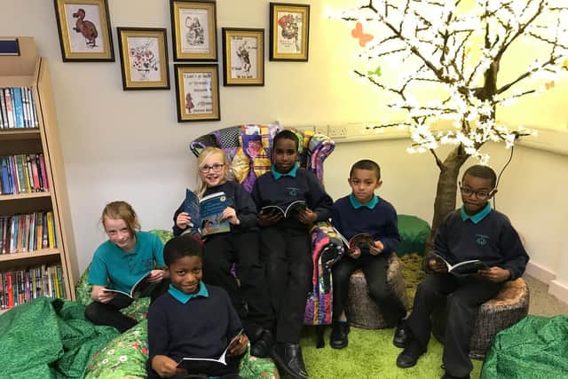 From left, Year 5 pupils Arina Korsaka, Mohamed Barry, Emily Dale, Suheb Osman, Ibrahim Abdur-Rahman and Mahmood Suleman in the newly-refurbished library.