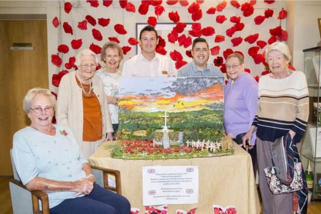 Shirley Smith's (far left) creation has been a hit with residents and staff at the retirement village. Pictures by Kirsty Edmonds