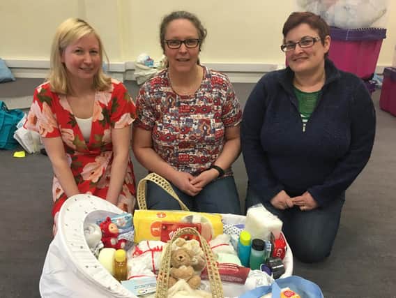 Volunteers at charities across Northampton, including Baby Basics (pictured), are in need of your Christmas gifts for others.
