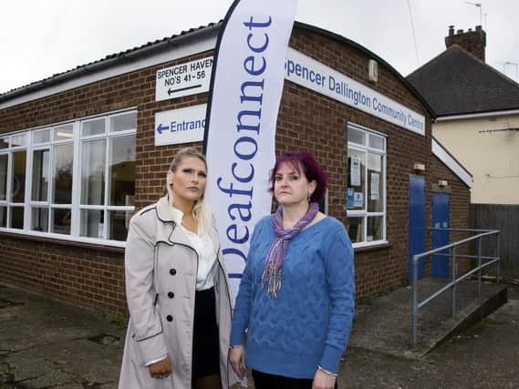 Deaf Connect in Spencer is facing having its funding cut by a quarter if the county council removes its yearly grant. Pictured are service user Lauren Jones and CEO Joanna Steer.