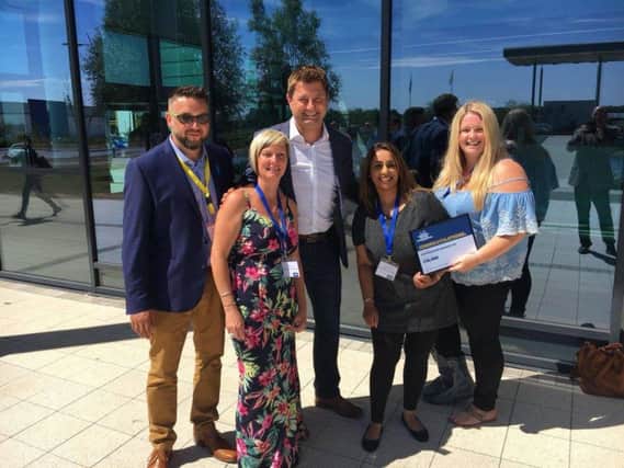 Right Resolution CIC pictured with TVs' The Restoration Man, George Clarke (centre) after collecting their Jewsons' funding award.