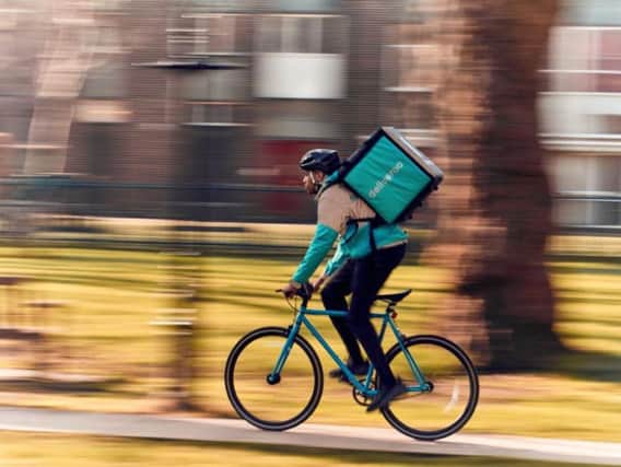 A Deliveroo courier
