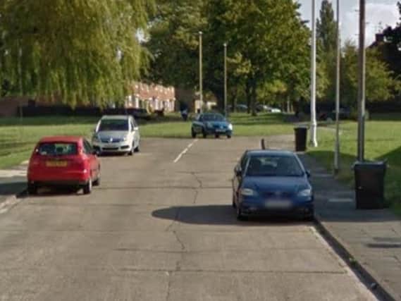 A man was knocked unconscious and robbed in Nene Walk.
