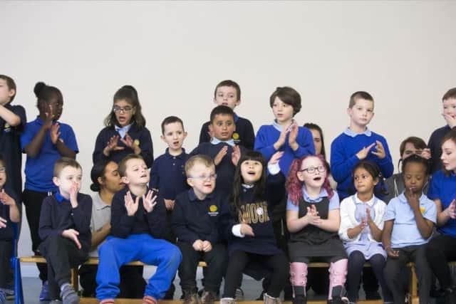 The choir sing 'Friends Forever'