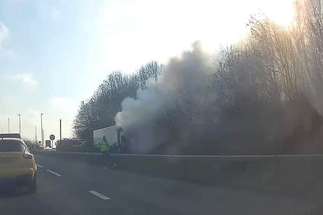 Dashcam footage shows smoke pouring from the lorry