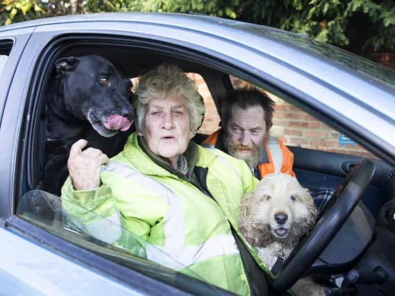 Jennifer Tysoe pictured with staffie Titan, her husband Nigel and cocker spaniel Becky. Picture: Kirsty Edmonds.