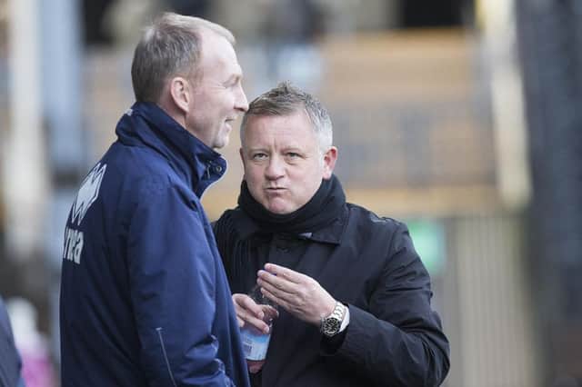 Chris Wilder and assistant Alan Knill on the touchline during Town's clash at Notts County three years ago