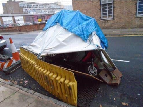 The mobility scooter after it was pushed over in Robert Street, the Mounts