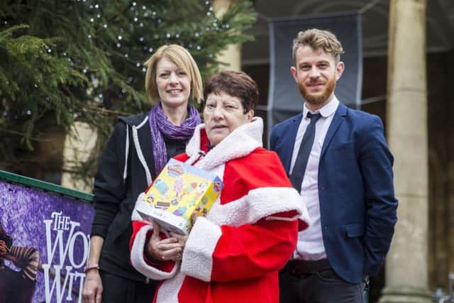 From left, manageress of All Saints Bistro, Theresa McDowell, our Christmas campaign co-ordinator Jeanette Walsh and the Chronicle & Echos content editor Paul Lynch.
