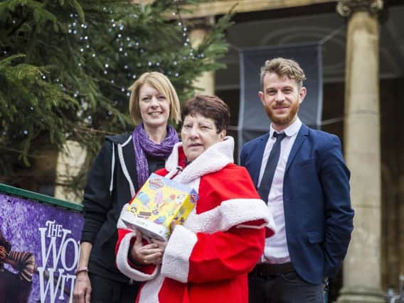 From left, manageress of All Saints Bistro, Theresa McDowell, our Christmas campaign co-ordinator Jeanette Walsh and the Chronicle & Echos content editor Paul Lynch.