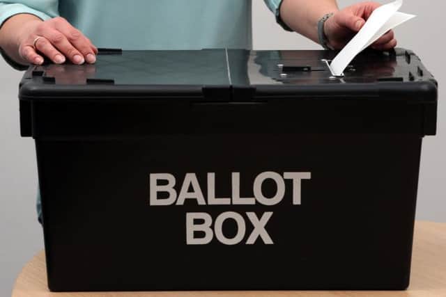 Residents cast their votes in yesterday's by-election