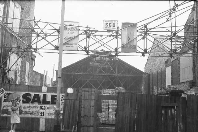 WL Richardson & Sons sign above the demolished Conservative Club in Northampton on February 25, 1960