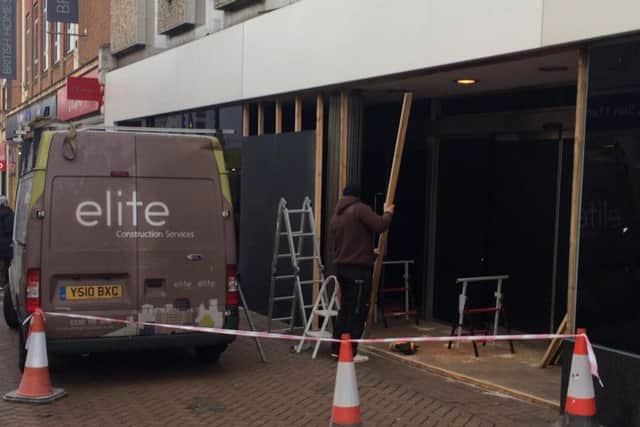 The front entrance of Marks and Spencer's was boarded off today.
