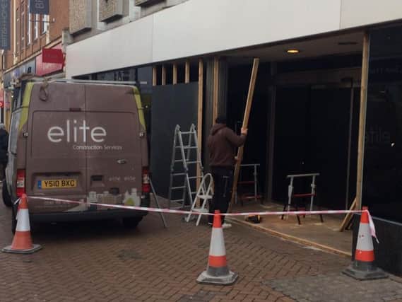 The front entrance of Marks and Spencer's was boarded off today.