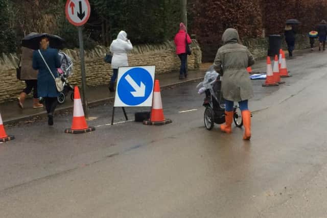 Traffic calming measures were pulled up outside Road Primary School, but a promised zebra crossing has been delayed.