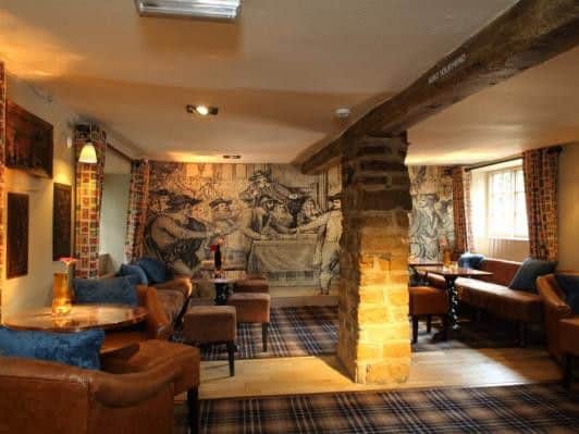 The Cromwell's owners have gone all-out to make a tavern full of character with unique decoration, bare-brick pillars and thick rustic oak beams. Take Oliver's lead and hideaway here for a while in this top-rated cosy pub.
