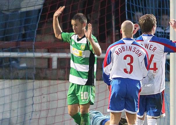 Dean Bowditch in action for Yeovil at Rushden & Diamonds at Nene Park in 2010