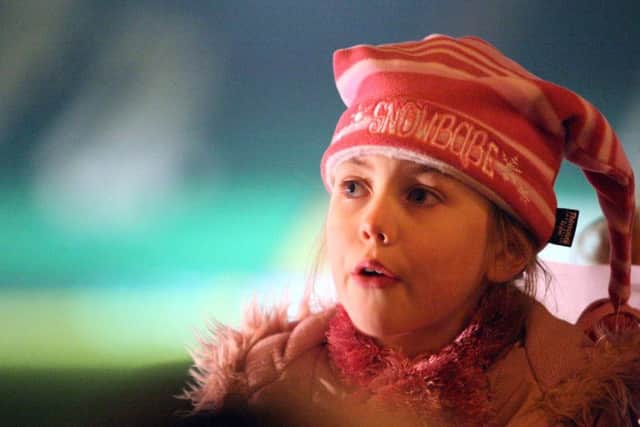 A pupil of Deanshanger Primary School singing at the Northampton Saints ground, Franklin's Gardens, at their 2007 carol concert. Children from local schools were joined by Saints players. Deanshanger  sang  the Coventry Carol.