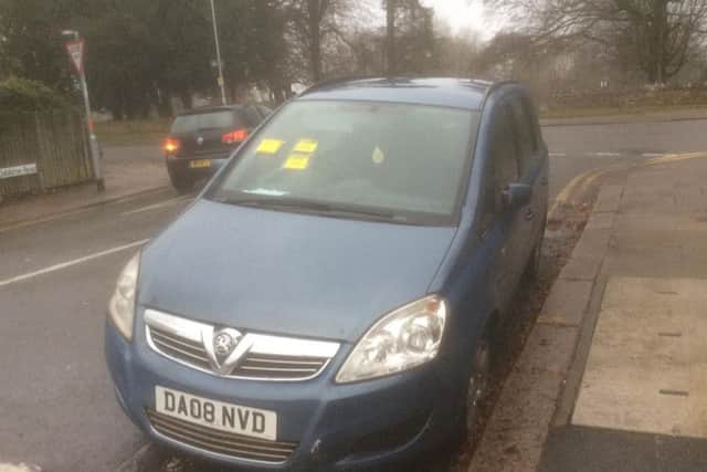 A blue Vauxhall Zafira has been parked on double-yellow lines for three months in a Northampton neighbourhood.