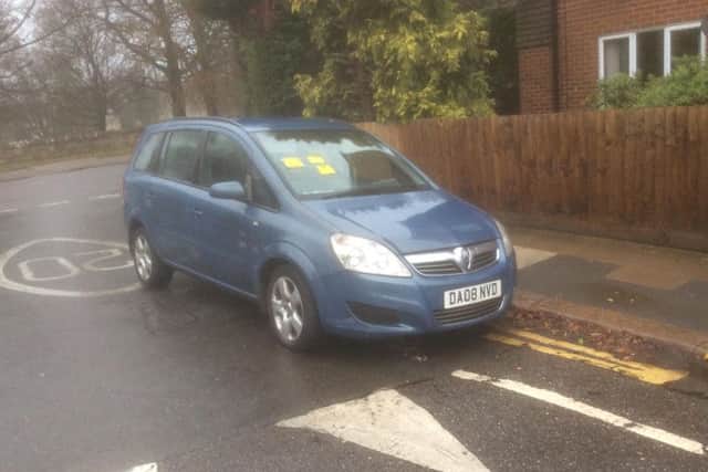 A resident says the car - which is just metres from the left-hand turn into the street - is an 'accident waiting to happen'.