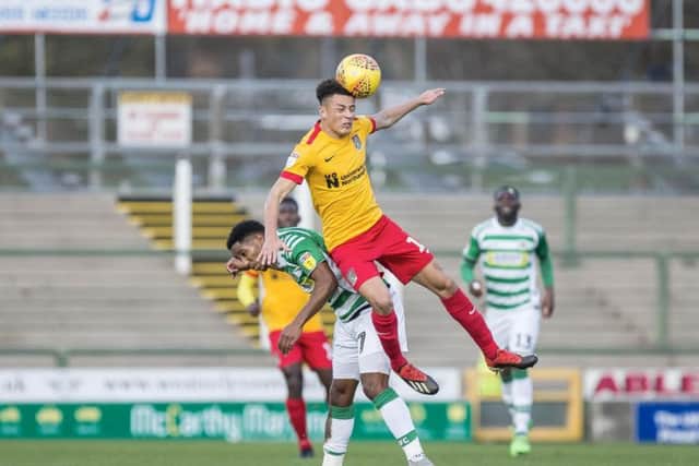 Shaun McWilliams wins a header