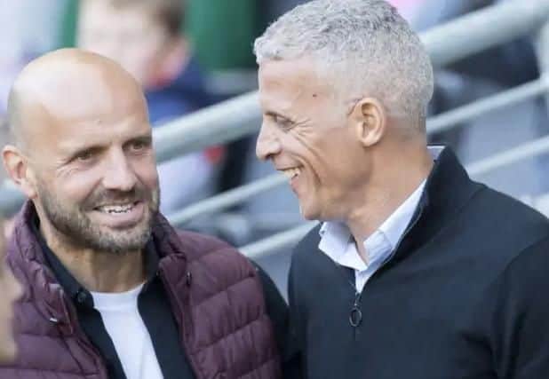 Familiar foes: Cobblers boss Keith Curle and MK Dons manager Paul Tisdale