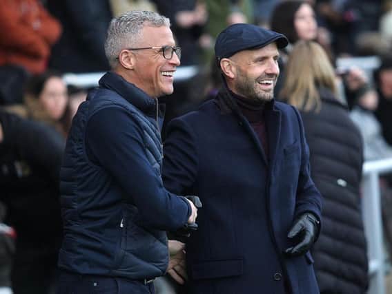 Keith Curle with opposite number Paul Tisdale. Picture: Sharon Lucey