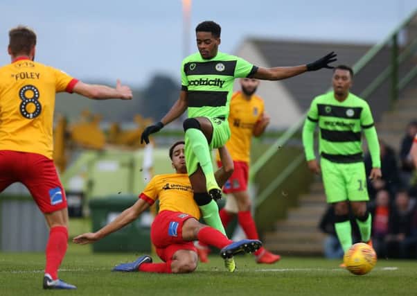 Jay Williams makes a challenge during the Cobblers' 2-1 defeat at Forest Green Rovers (Pictures: Pete Norton)