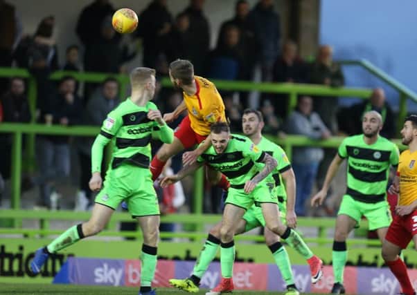 Sam Foley heads home the Cobblers' equaliser at Forest Green (Picture: Pete Norton/Getty Images)